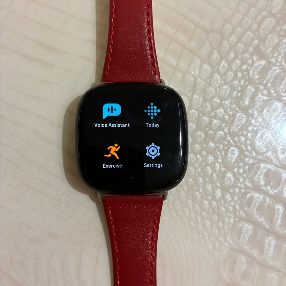 Fitbit Smartwatch with Red Strap